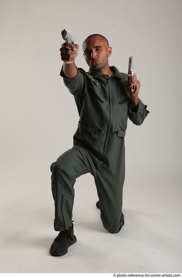 Man Adult Average Black Fighting with gun Kneeling poses Casual