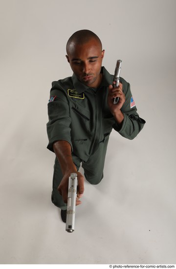 Man Adult Average Black Fighting with gun Kneeling poses Casual