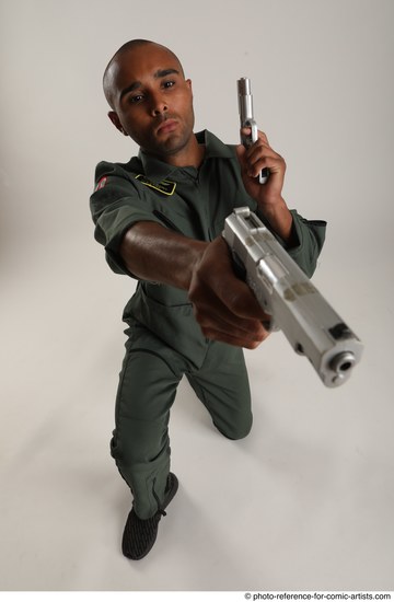 Man Adult Average Black Fighting with gun Kneeling poses Casual