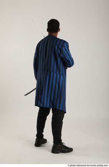 Man Adult Average Black Fighting with sword Standing poses Casual