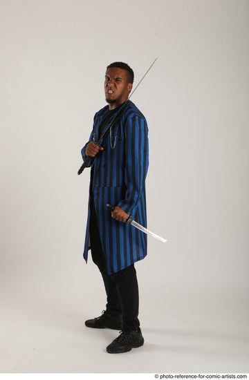 Man Adult Average Black Fighting with sword Standing poses Casual