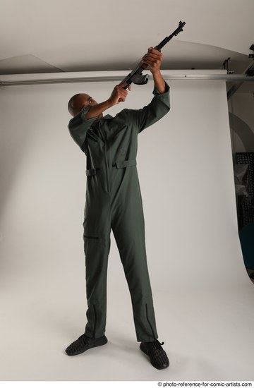 Man Adult Average Black Fighting with gun Standing poses Army