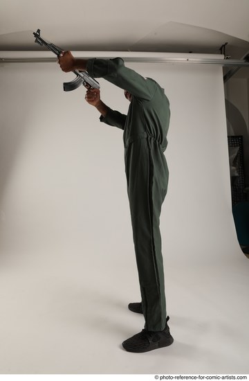 Man Adult Average Black Fighting with gun Standing poses Army