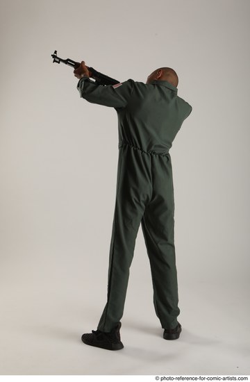 Man Adult Average Black Fighting with gun Standing poses Army