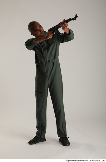 Man Adult Average Black Fighting with gun Standing poses Army