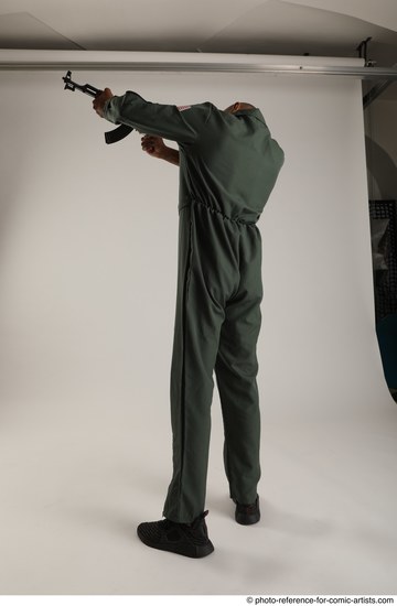 Man Adult Average Black Fighting with gun Standing poses Army