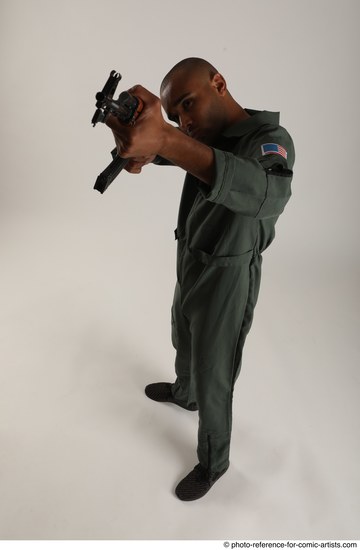 Man Adult Average Black Fighting with gun Standing poses Army