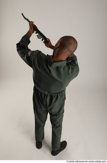 Man Adult Average Black Fighting with gun Standing poses Army