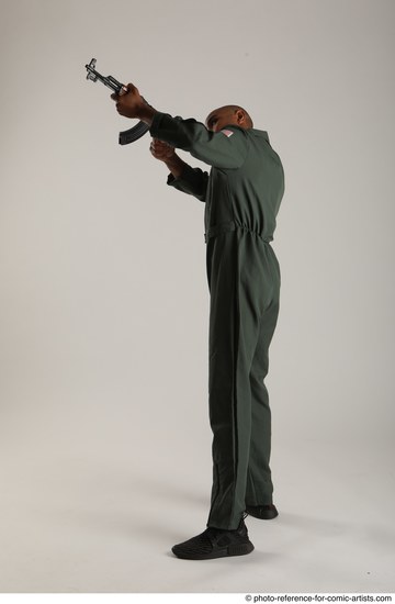 Man Adult Average Black Fighting with gun Standing poses Army