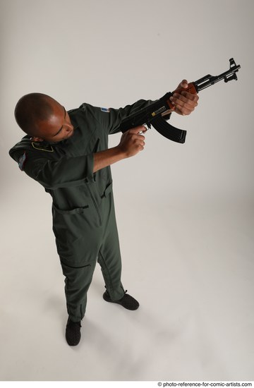 Man Adult Average Black Fighting with gun Standing poses Army