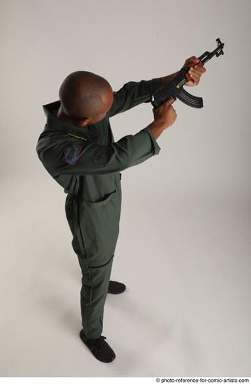 Man Adult Average Black Fighting with gun Standing poses Army