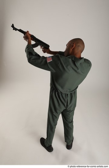 Man Adult Average Black Fighting with gun Standing poses Army