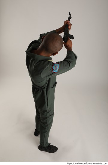 Man Adult Average Black Fighting with gun Standing poses Army