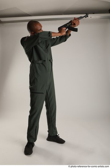 Man Adult Average Black Fighting with gun Standing poses Army