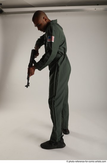 Man Adult Average Black Fighting with gun Standing poses Army