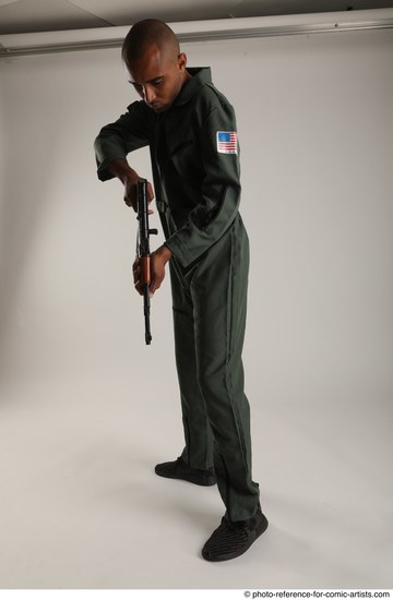 Man Adult Average Black Fighting with gun Standing poses Army