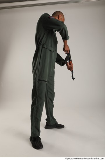 Man Adult Average Black Fighting with gun Standing poses Army