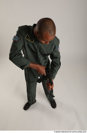 Man Adult Average Black Fighting with gun Standing poses Army