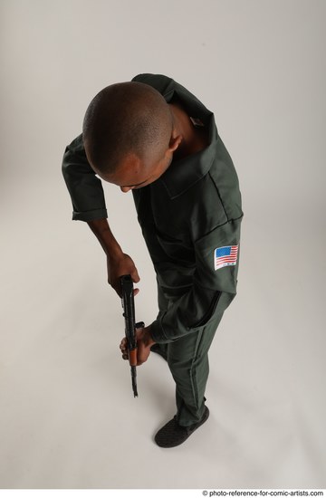 Man Adult Average Black Fighting with gun Standing poses Army