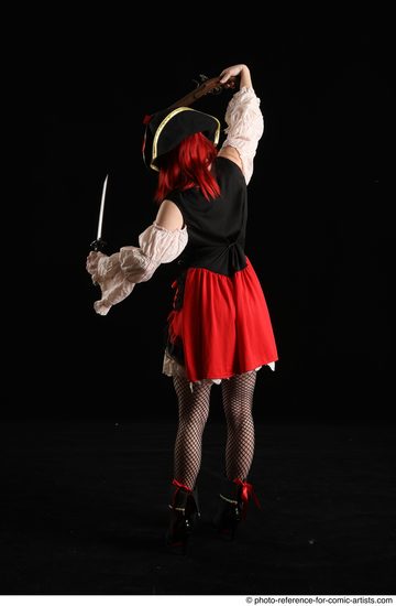 Woman Adult Average White Fighting with gun Standing poses Casual