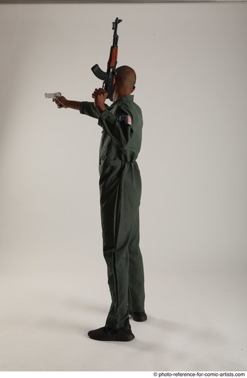 Man Adult Average Black Fighting with gun Standing poses Army