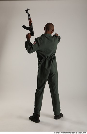 Man Adult Average Black Fighting with gun Standing poses Army