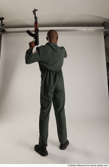 Man Adult Average Black Fighting with gun Standing poses Army