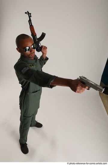 Man Adult Average Black Fighting with gun Standing poses Army