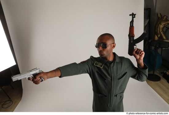 Man Adult Average Black Fighting with gun Standing poses Army