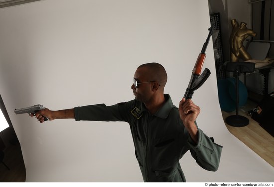 Man Adult Average Black Fighting with gun Standing poses Army