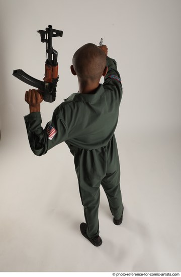 Man Adult Average Black Fighting with gun Standing poses Army