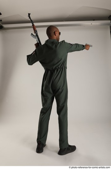 Man Adult Average Black Fighting with gun Standing poses Army