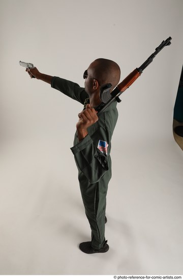 Man Adult Average Black Fighting with gun Standing poses Army