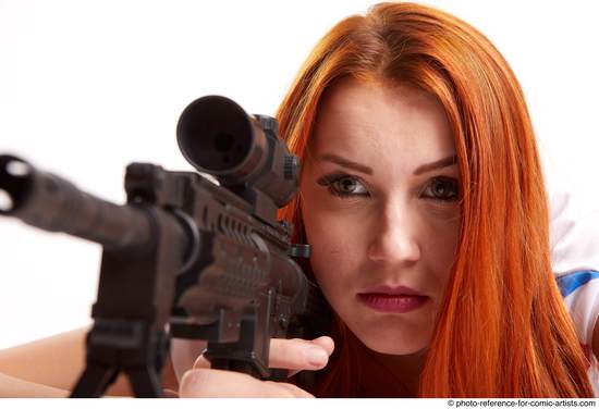 Woman Adult Average White Fighting with gun Laying poses Casual