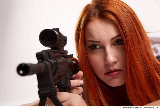 Woman Adult Average White Fighting with gun Laying poses Casual