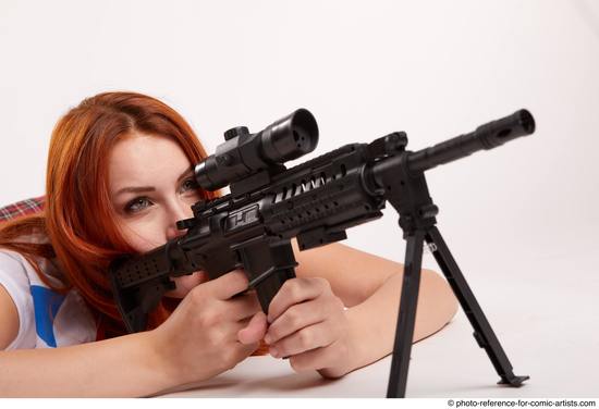Woman Adult Average White Fighting with gun Laying poses Casual