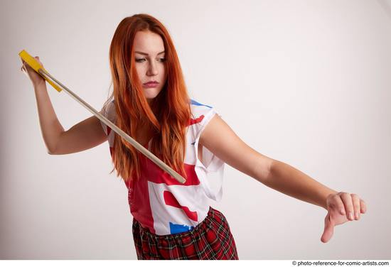 Woman Adult Average White Fighting with sword Standing poses Casual