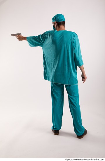 Man Adult Average White Fighting with gun Standing poses Casual