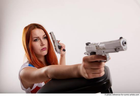 Woman Adult Average White Fighting with gun Kneeling poses Casual