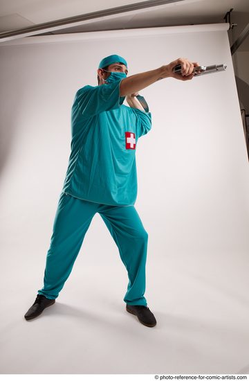 Man Adult Average White Fighting with gun Standing poses Casual