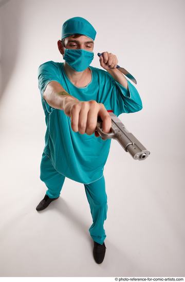 Man Adult Average White Fighting with gun Standing poses Casual