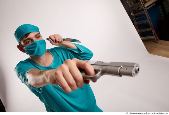 Man Adult Average White Fighting with gun Standing poses Casual