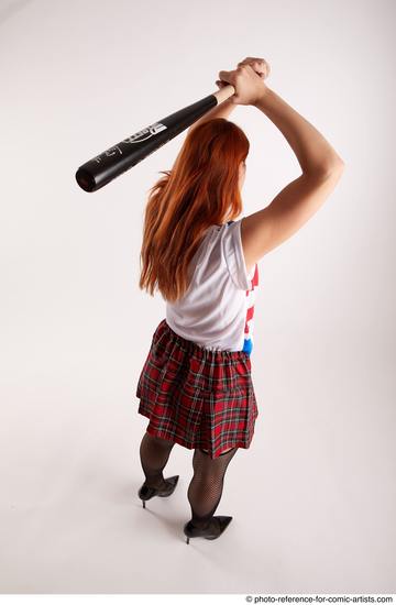 Woman Adult Average White Standing poses Casual Fighting with bat