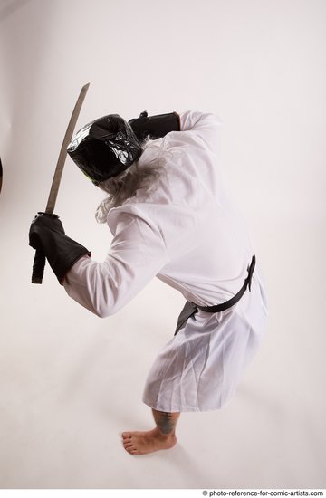 Man Adult Average White Fighting with knife Standing poses Casual