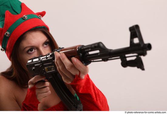 Woman Adult Average White Fighting with gun Kneeling poses Casual