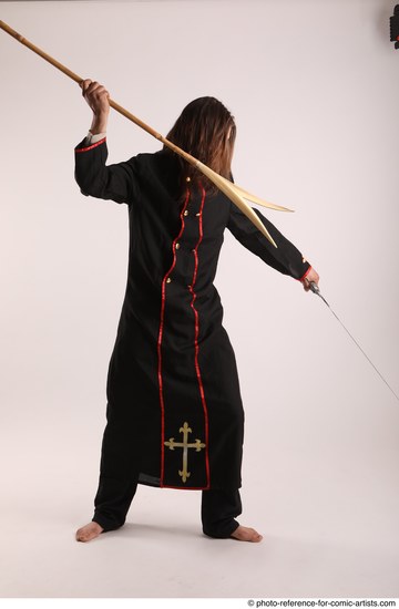 Man Adult Average White Fighting with sword Standing poses Coat