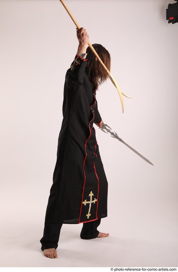 Man Adult Average White Fighting with sword Standing poses Coat