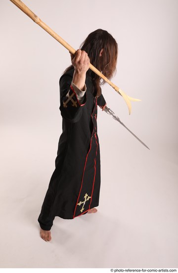 Man Adult Average White Fighting with sword Standing poses Coat