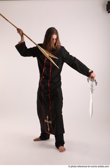 Man Adult Average White Fighting with sword Standing poses Coat