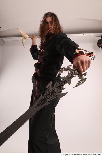 Man Adult Average White Fighting with sword Standing poses Coat